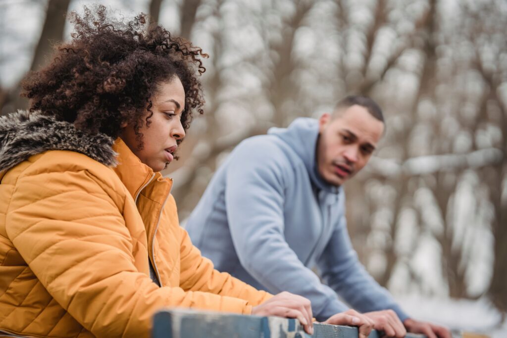 couple having tough conversation, emotional safety in relationships and marriage can be uncomfortablr